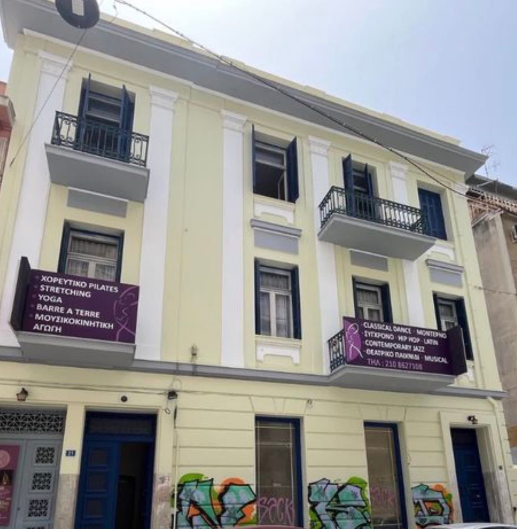Neoclassical building facade on Fokionos Negri, Athens Center