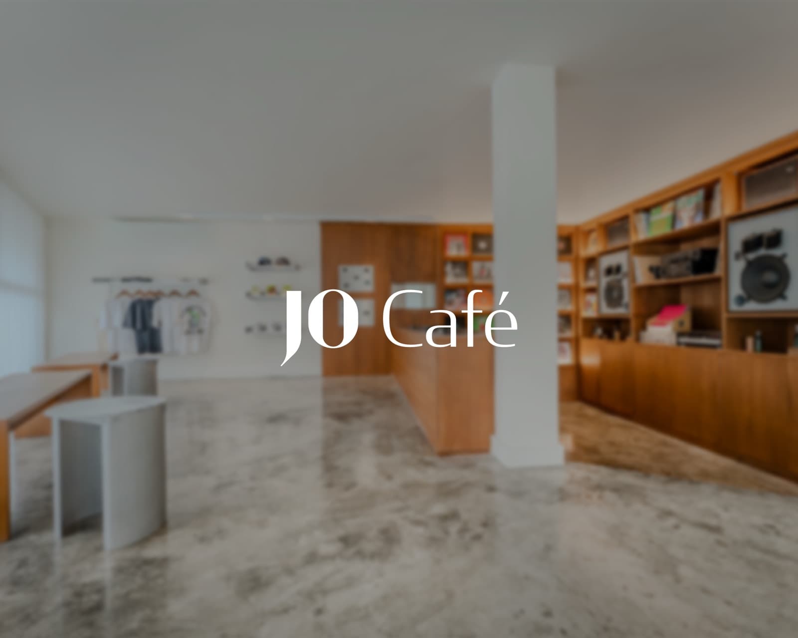 JO Café bright modern interior with stainless counter